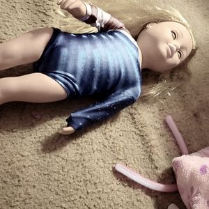 I am selling a gymnast american girl doll